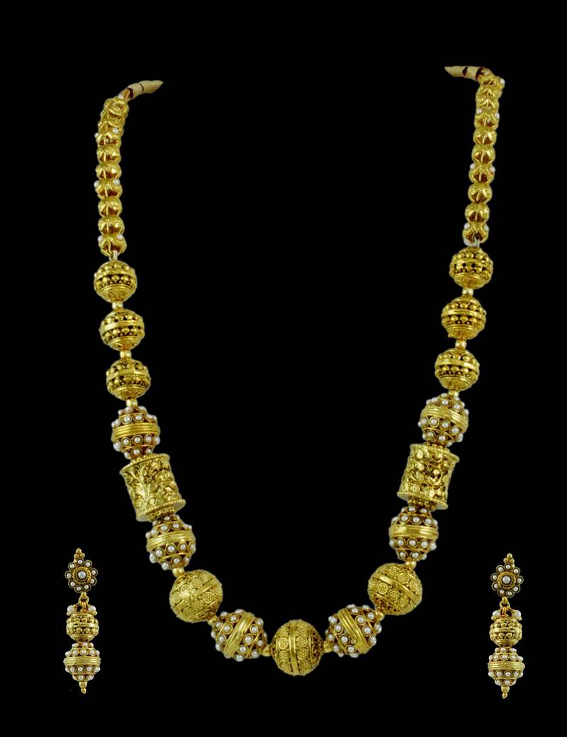 Buy Rajwadi Mala Earrings in Clear Color and Golden Polish Online