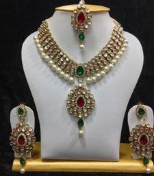 Buy Dazzling kundan set in red and green stones and pearls necklace-set online 