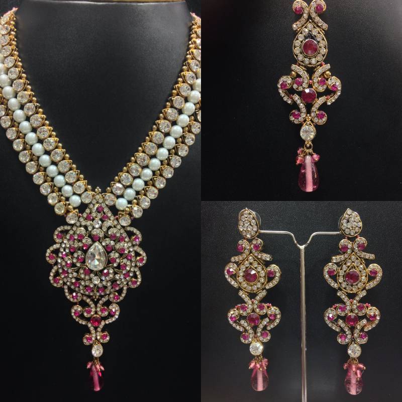 Buy Anarkali Kundan Jewelry Set with Pearls in Pink Online